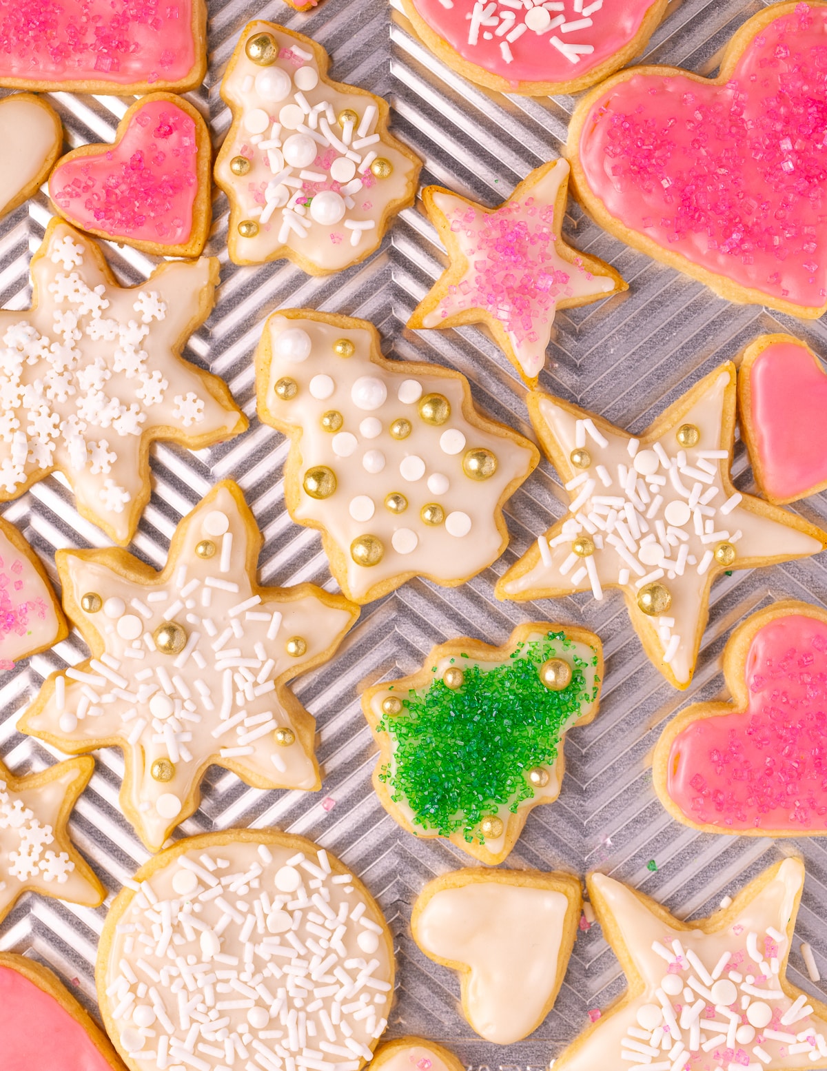 decorated vegan sugar cookies on a baking tray 