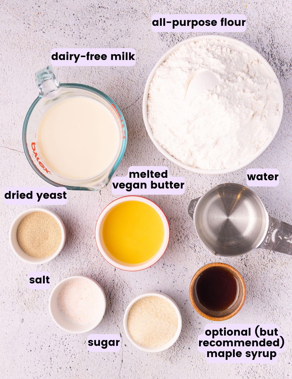 flour, dairy-free milk. yeast, melted vegan butter, water, sugar, salt, maple syrup. 