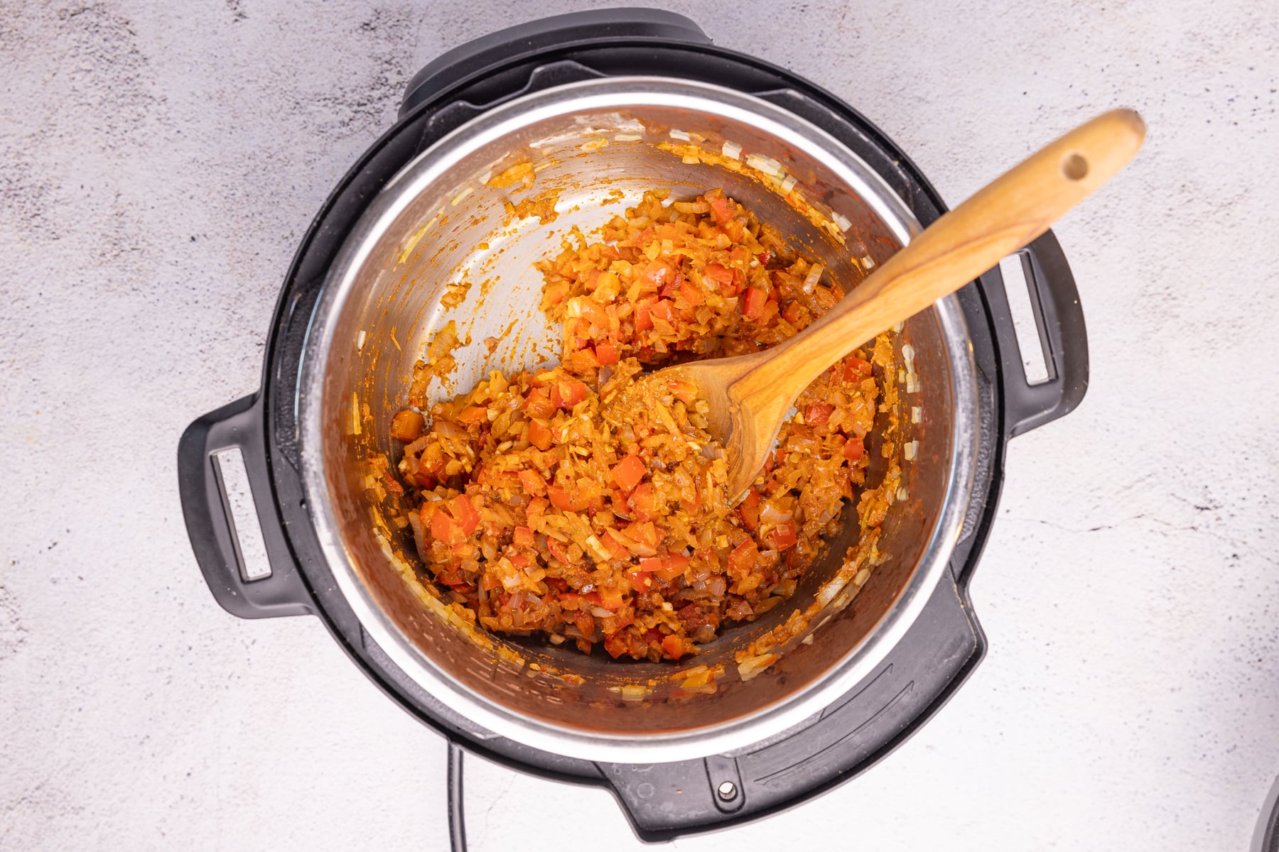 sauteed onions, bell pepper, garlic, tomato paste and herbs in an Instant Pot