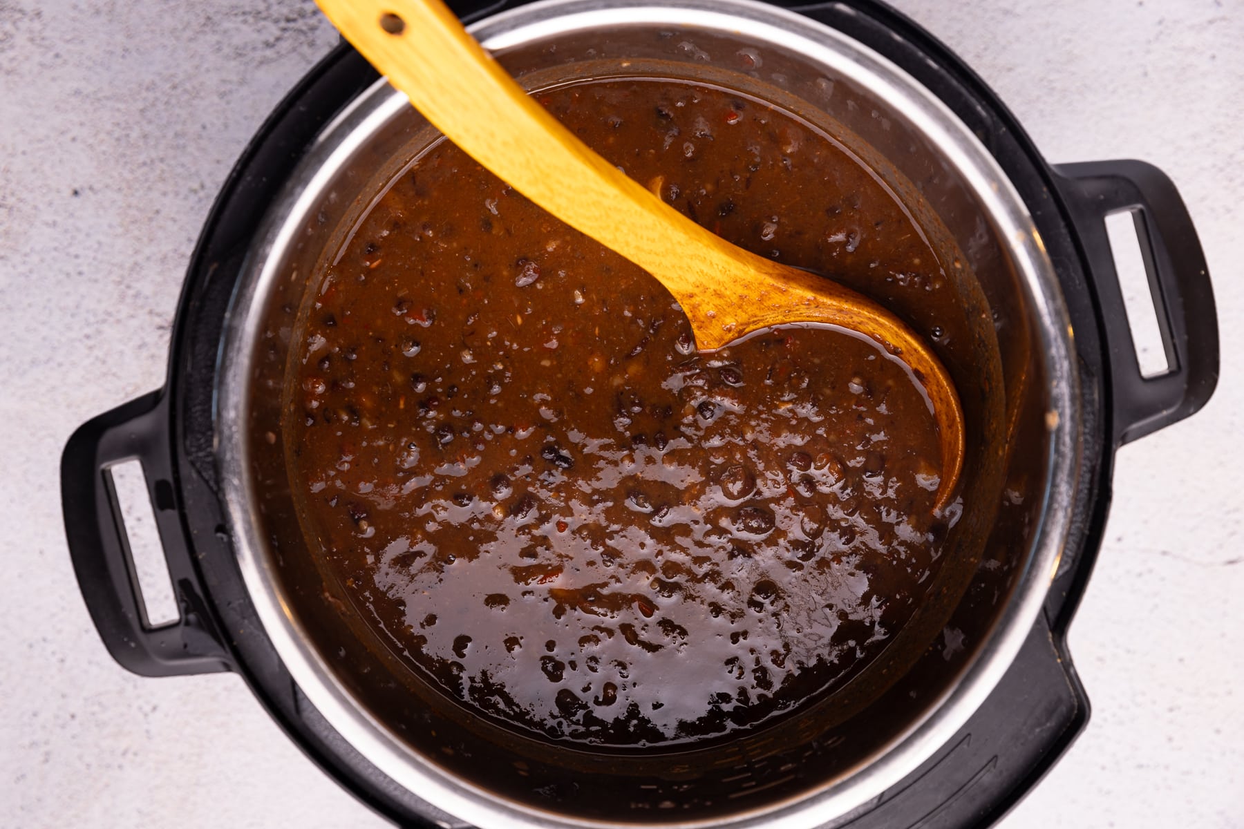 partially blended black bean soup in an Instant Pot. 