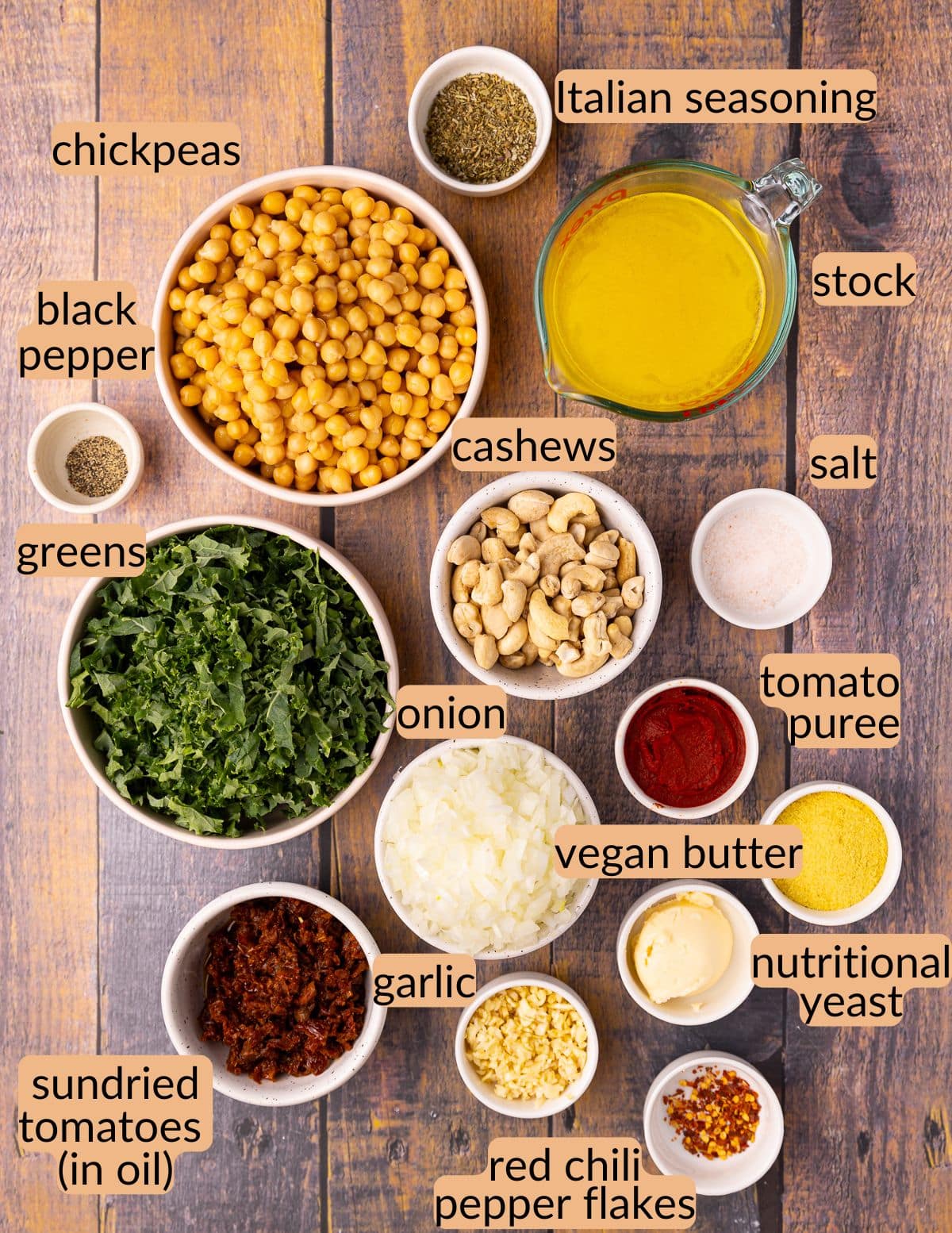 Ingredients for Marry Me Chickpeas: Italian seasoning, chickpeas, stock, black pepper, cashews, salt, kale or spinach, onion, garlic, tomato puree, nutritional yeast, vegan butter, sun-dried tomatoes in oil, red chili pepper flakes. 