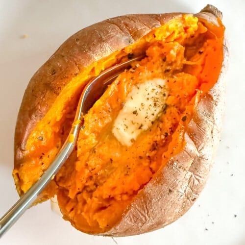 a split sweet potato with vegan butter