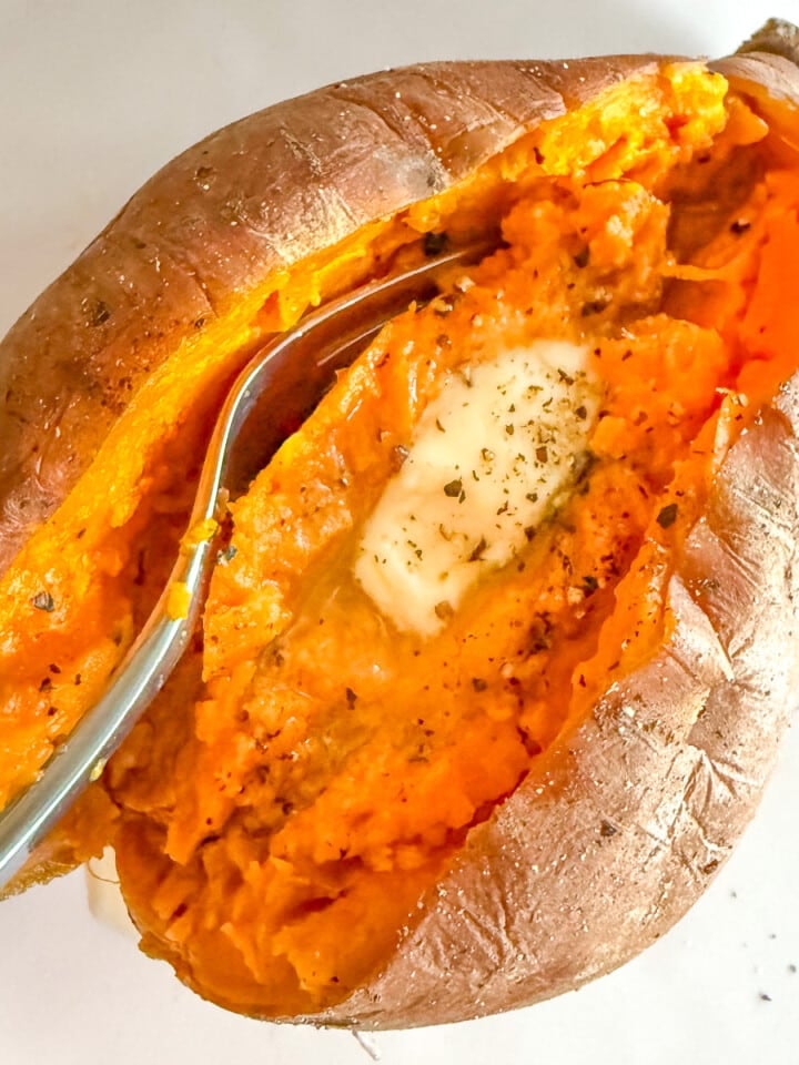 a split sweet potato with vegan butter