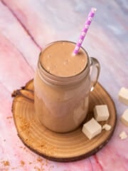 a chocolatey tofu smoothie in a glass