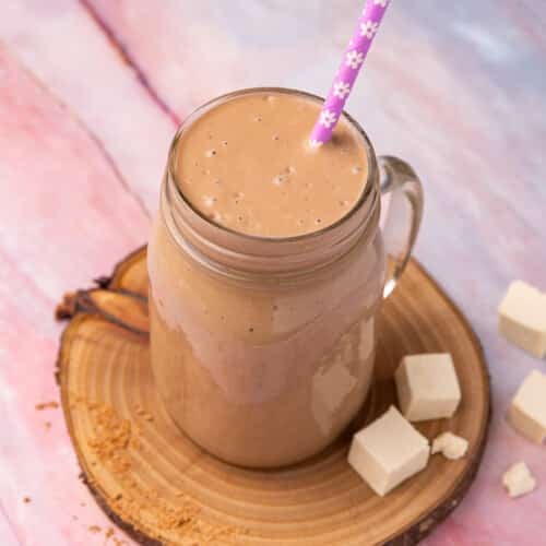 a chocolatey tofu smoothie in a glass