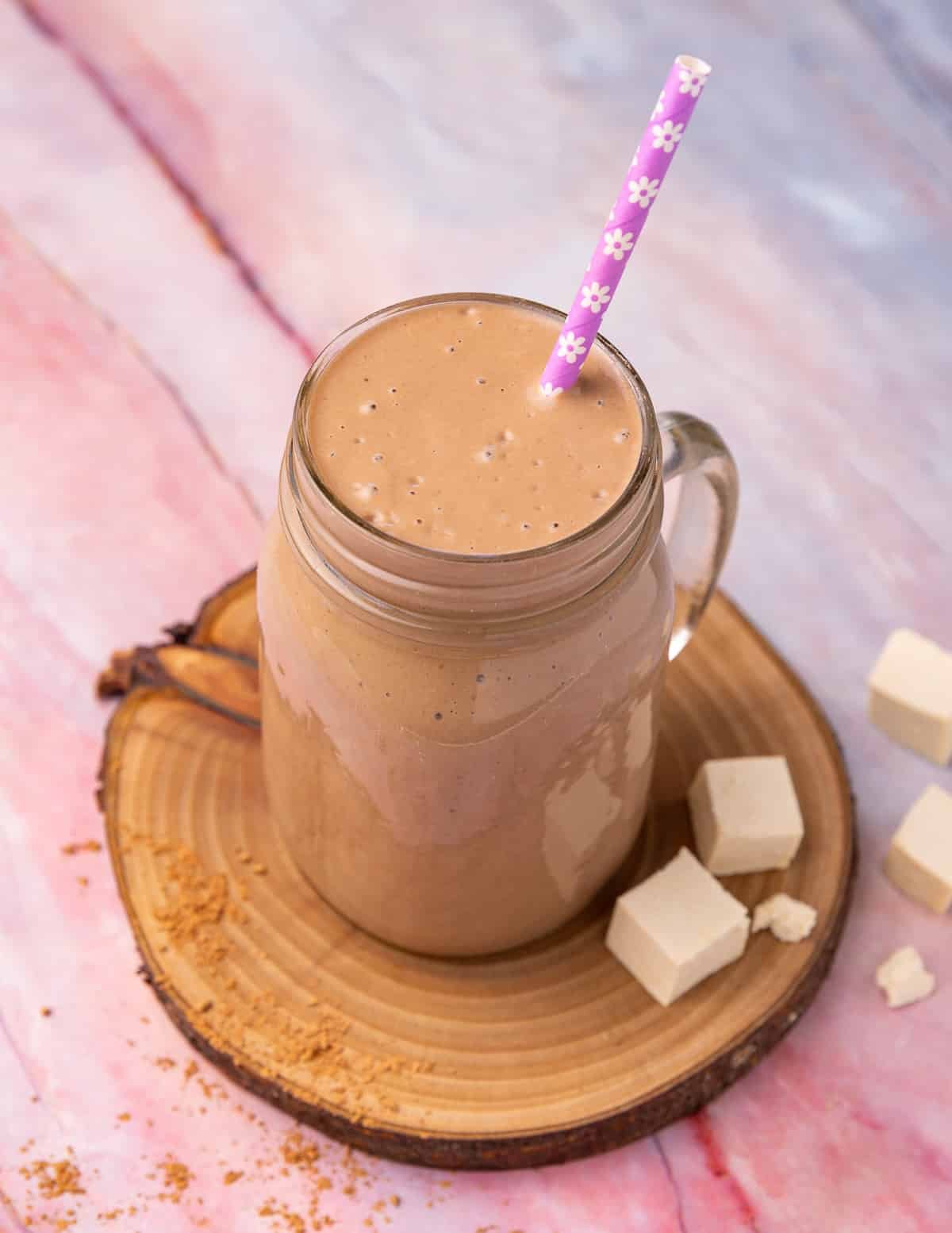 a chocolatey tofu smoothie in a glass