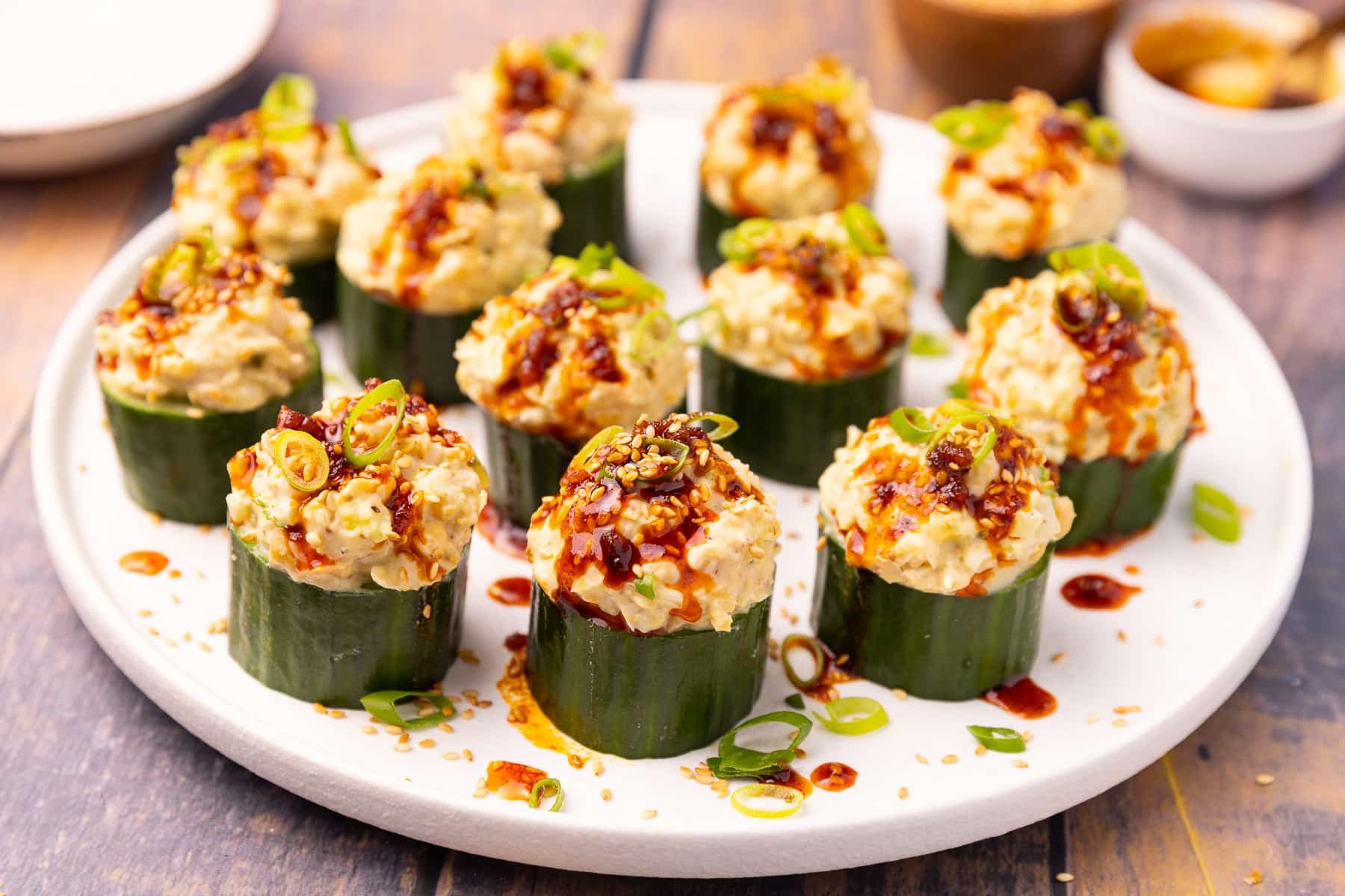 stuffed cucumber cups drizzled with chili oil