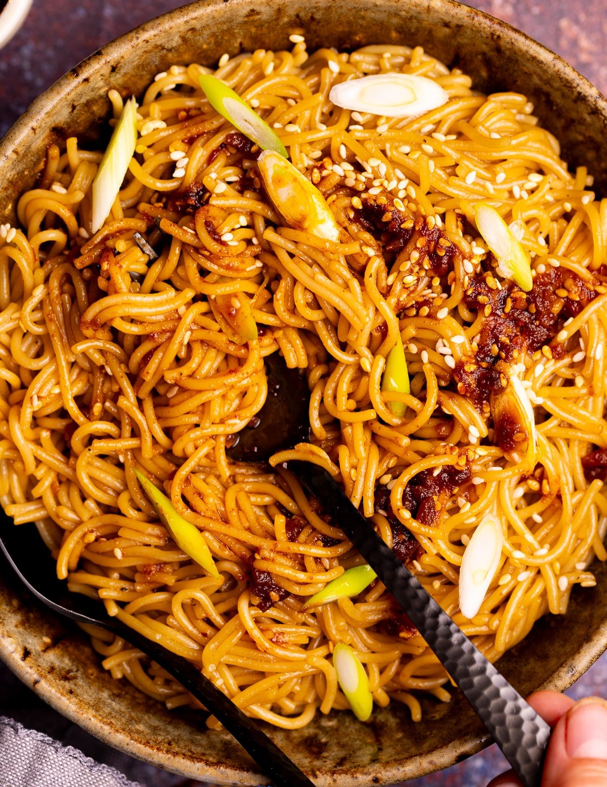 a bowl of noodles with chili oil