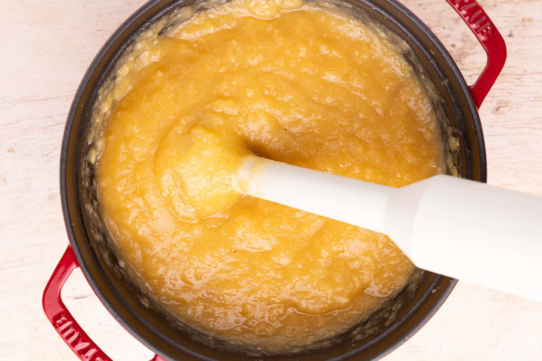 blending applesauce in a pan