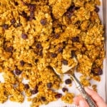 clumpy pumpkin seed granola on a baking tray