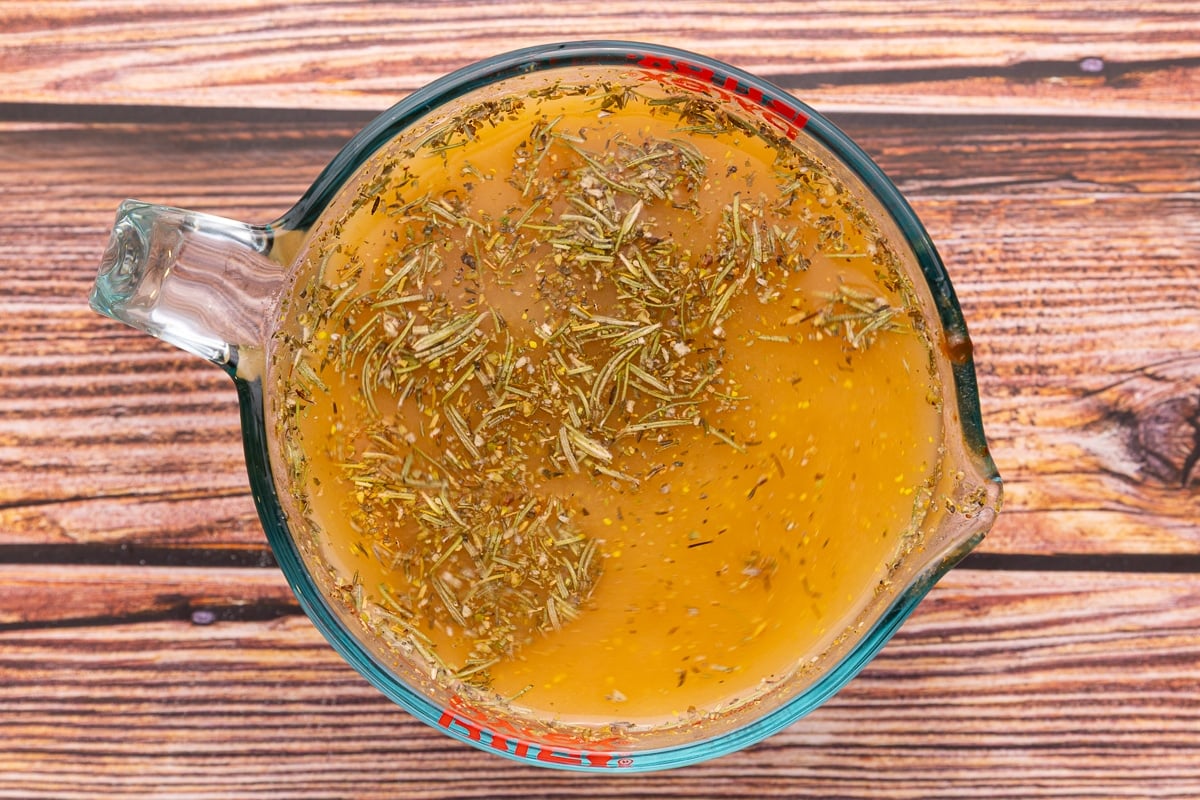stock and seasonings mixed together in a jug