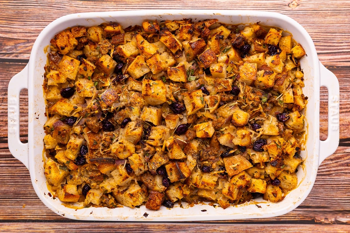 cooked vegan stuffing in a white dish
