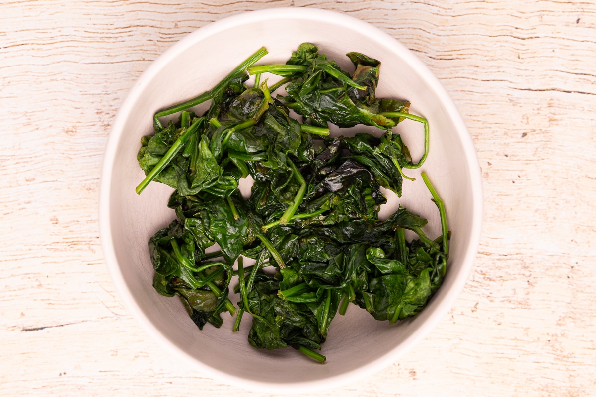 wilted spinach in a bowl