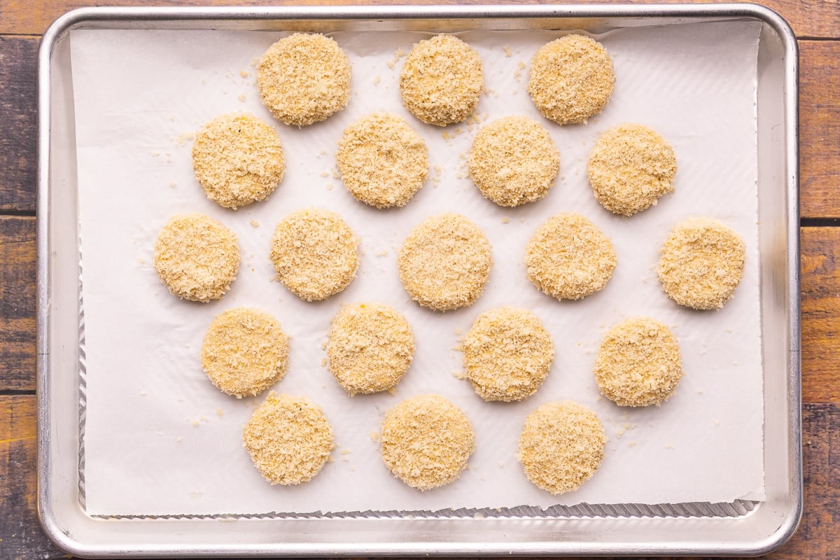 breaded chickpea nuggets on a baking tray