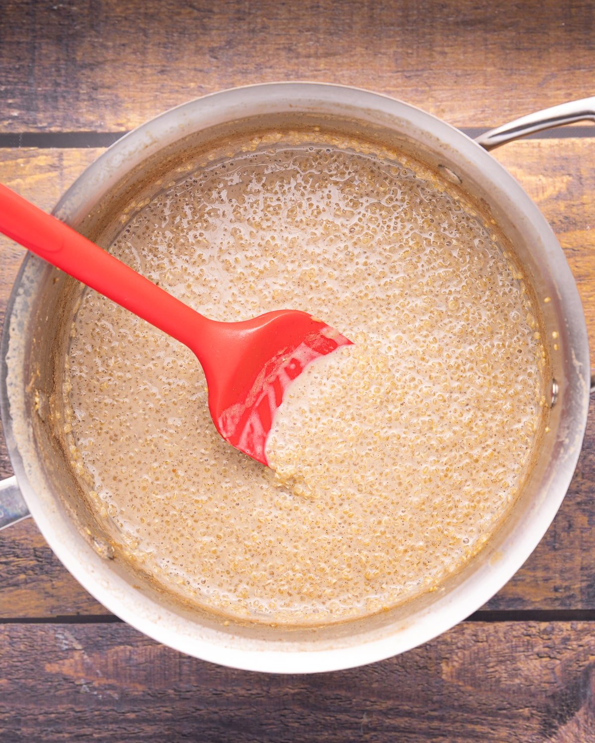 creamy quinoa pudding in a saucepan