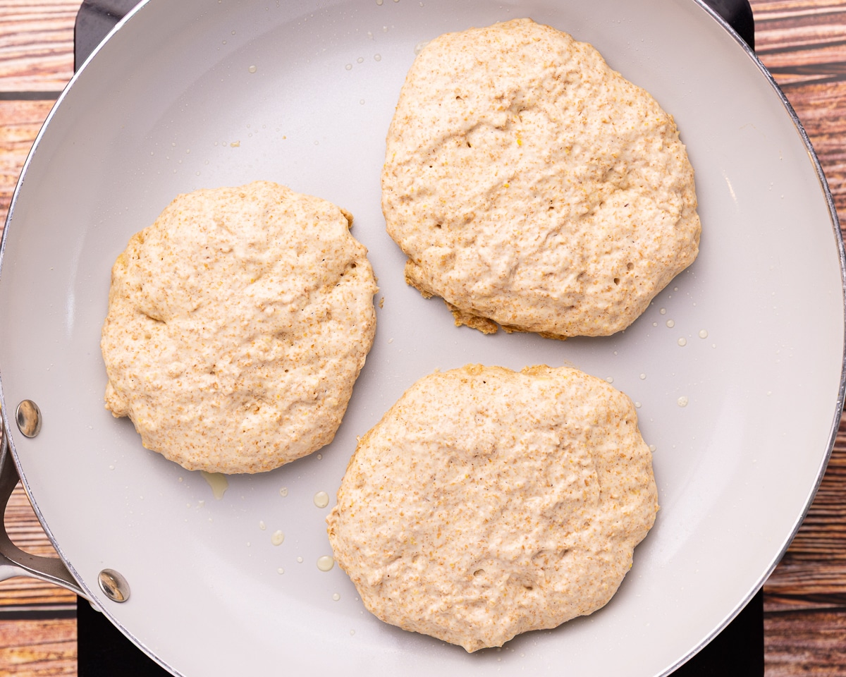 pancakes cooking in a pan