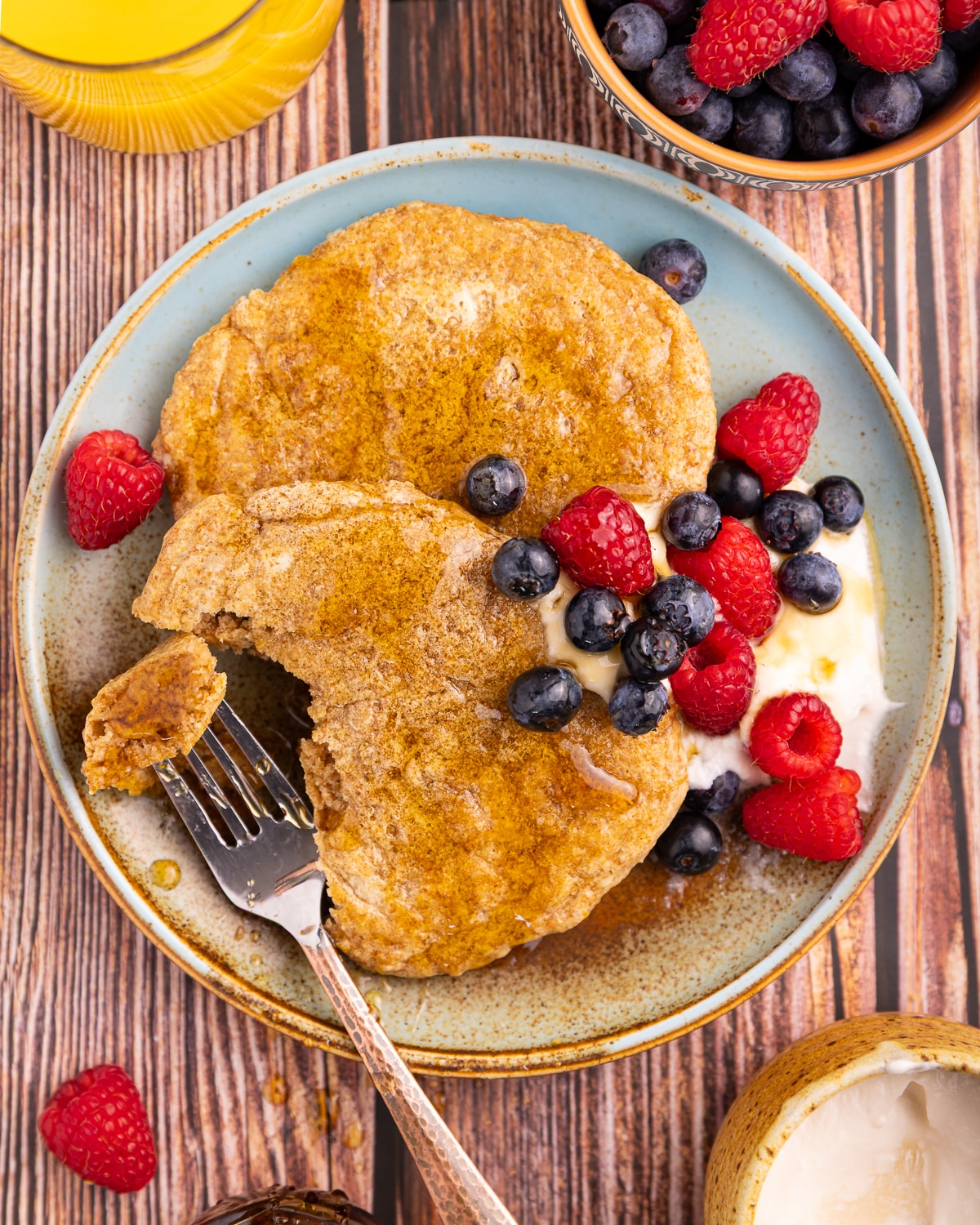 healthy pancakes with berries and dairy-free yogurt