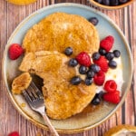 healthy vegan oil-free pancakes with yogurt and berries
