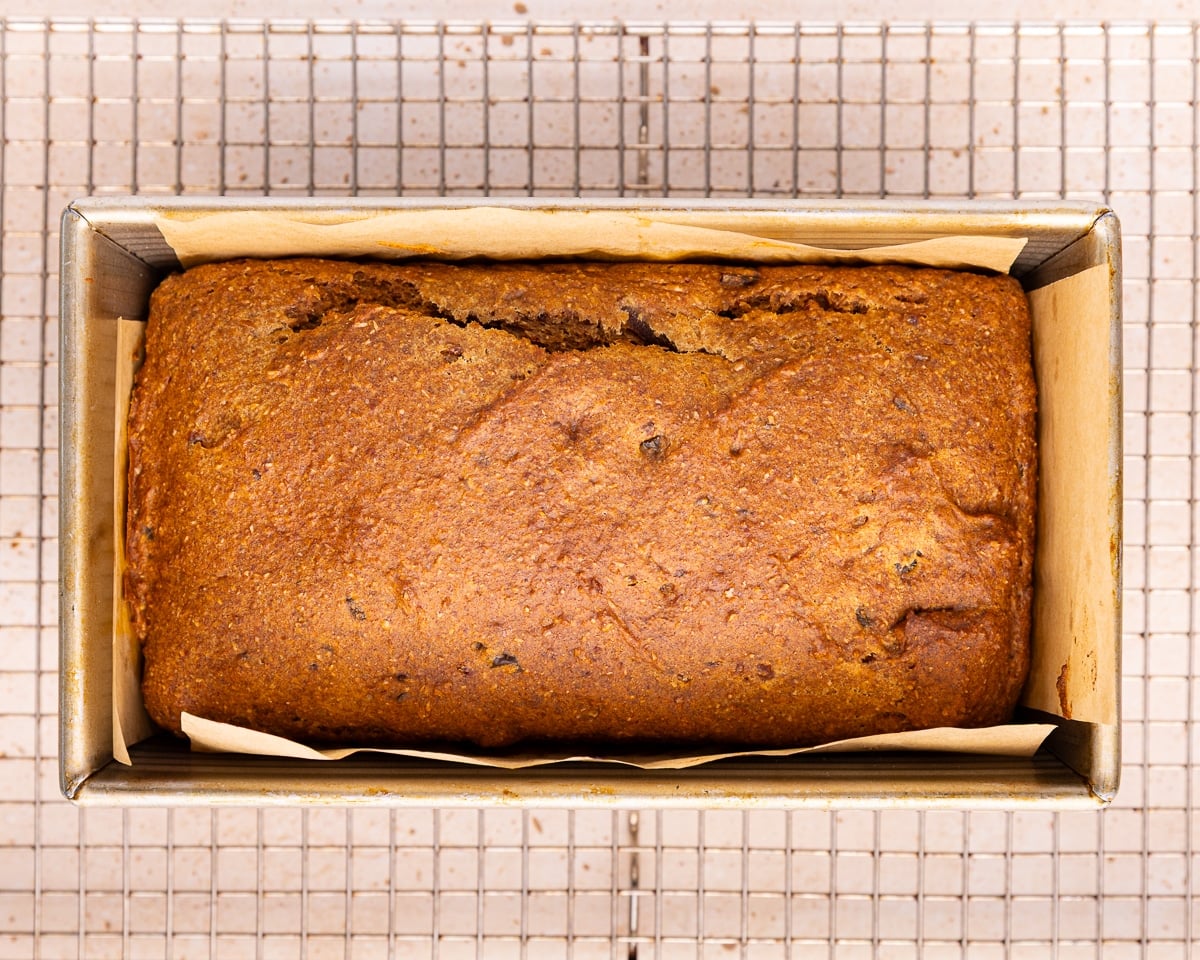 cooked banana date bread in a loaf pan