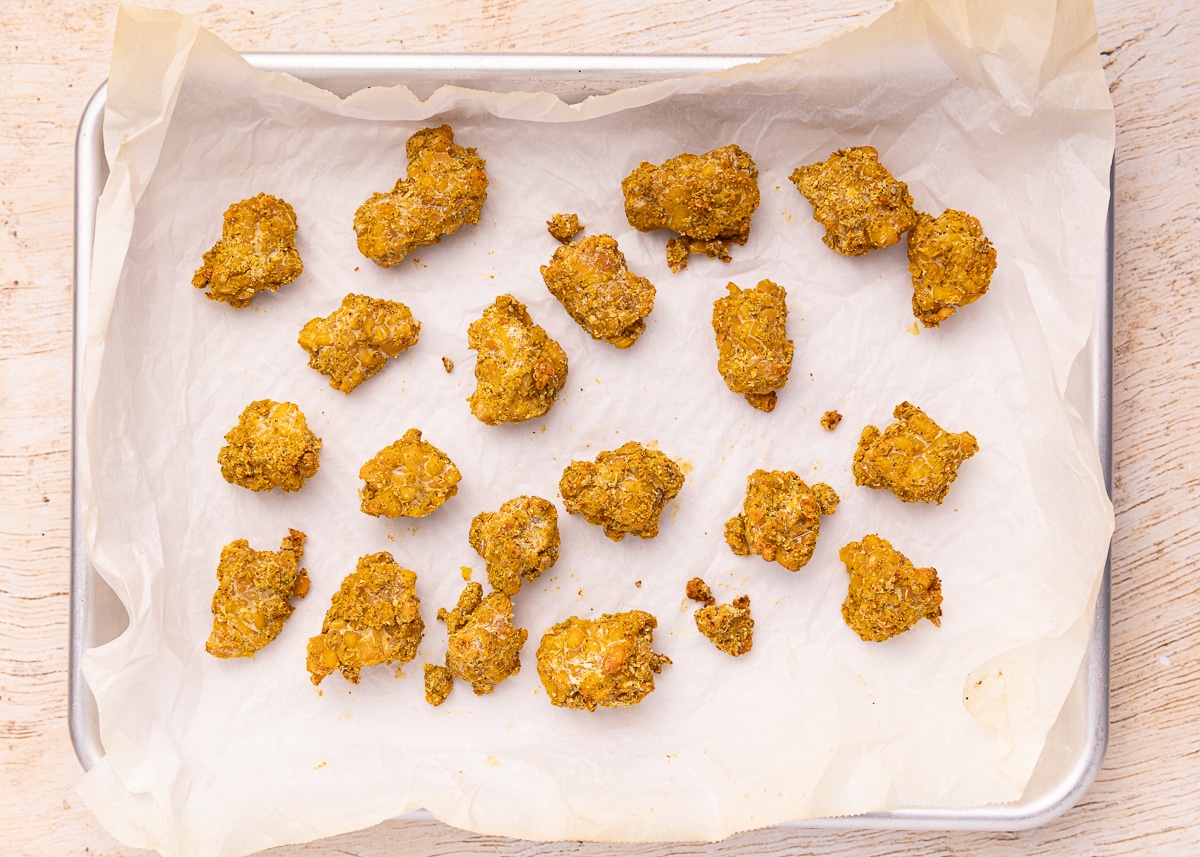 cooked nutritional yeast tempeh on a baking tray