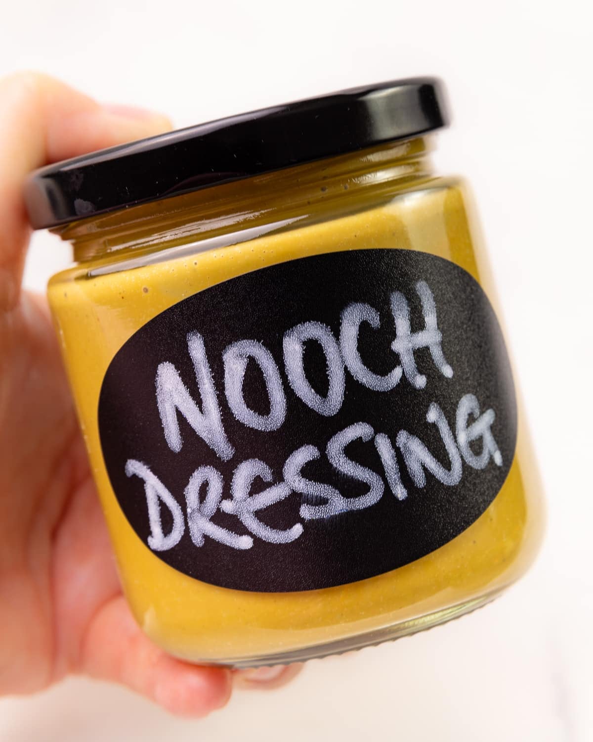 a jar of nooch dressing