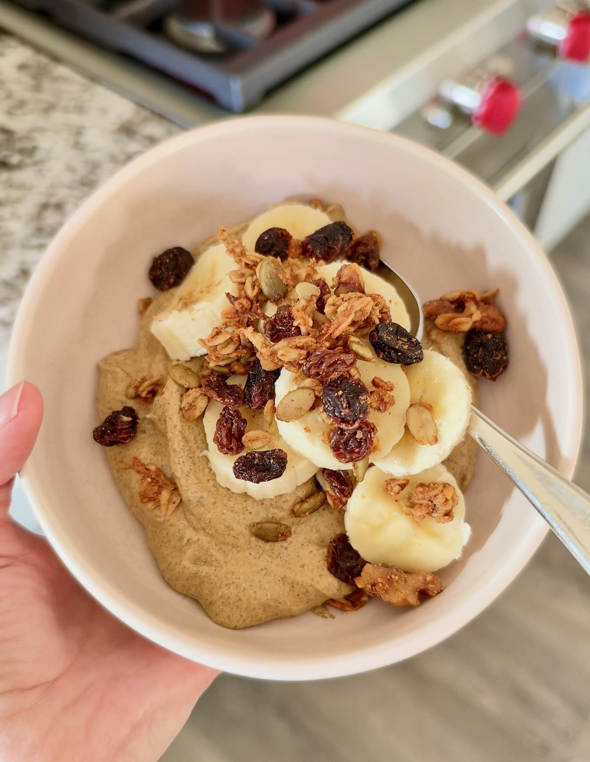 pumpkin chia pudding with sliced banana and granola