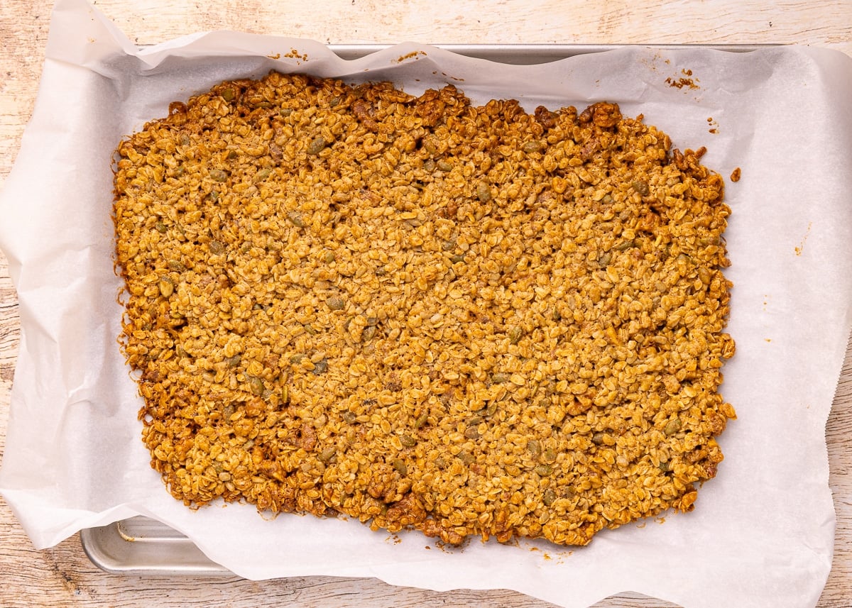 cooked granola on a baking tray