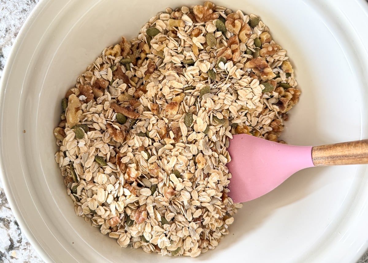 dried granola ingredients in a mixing bowl