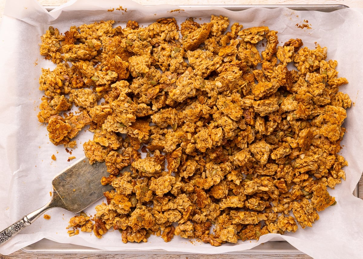 broken up granola on a baking tray