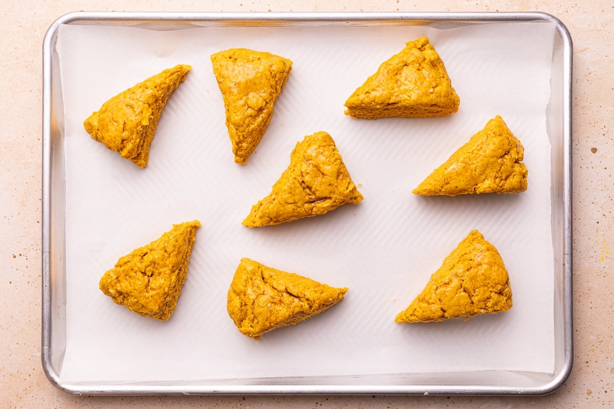 uncooked scones on a baking tray